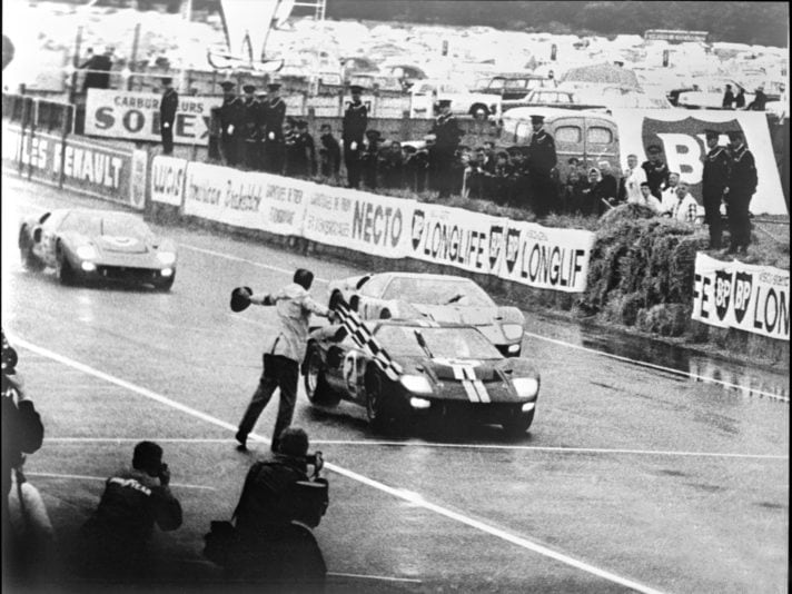 Trio of Ford GT40 Mk IIs cross finish line at Le Mans 1966
