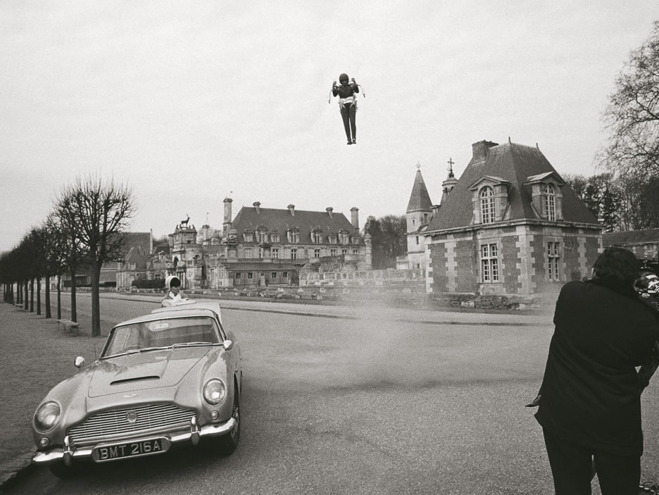 The force of the jet pack can be seen whipping up the dust and s